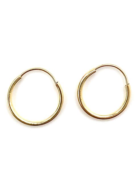 solid gold small hoops.